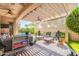 Inviting covered patio with lounge chairs, a ceiling fan, and views of the sparkling pool at 35756 N Clementine Trl, San Tan Valley, AZ 85140