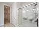 Bathroom with a glass enclosed shower and tile floors at 4205 W Maggie Dr, San Tan Valley, AZ 85144