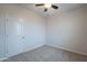 Bedroom featuring neutral carpet and a door to the hallway at 4205 W Maggie Dr, San Tan Valley, AZ 85144