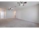 Large bonus room with overhead fans and nearby bathroom at 4205 W Maggie Dr, San Tan Valley, AZ 85144