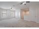 Large bonus room with natural light and neutral carpet at 4205 W Maggie Dr, San Tan Valley, AZ 85144