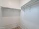 Walk-in closet with shelving and a wire rack for organized storage at 4205 W Maggie Dr, San Tan Valley, AZ 85144