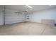 Spacious two-car garage with epoxy flooring and an automatic door opener at 4205 W Maggie Dr, San Tan Valley, AZ 85144