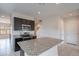 Modern kitchen with a large center island and stainless steel appliances, offering an inviting and functional cooking space at 4205 W Maggie Dr, San Tan Valley, AZ 85144