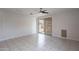Spacious living room featuring tiled floors and sliding doors to the backyard at 4205 W Maggie Dr, San Tan Valley, AZ 85144