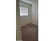 Bedroom with carpet, one window and fresh paint at 5139 E Tano St, Phoenix, AZ 85044