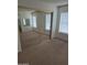 Bedroom with carpet and large mirror closet doors at 5139 E Tano St, Phoenix, AZ 85044