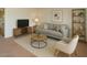 Inviting living room with modern furnishings, soft colors, and cozy decor at 5139 E Tano St, Phoenix, AZ 85044