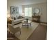 Bright living room featuring neutral tones, stylish decor, and ample natural light at 5139 E Tano St, Phoenix, AZ 85044