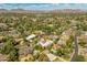 An aerial view of the home shows its location in a residential neighborhood, close to parks and natural spaces at 523 W Vista Ave, Phoenix, AZ 85021