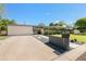 Stunning single-story home with desert landscaping and modern design, plus a gray driveway and decorative rocks at 523 W Vista Ave, Phoenix, AZ 85021
