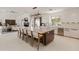 Expansive modern kitchen with a large central island, designer lighting, and stainless steel appliances at 523 W Vista Ave, Phoenix, AZ 85021