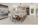 Bright and modern kitchen featuring a large center island, stainless appliances, and sleek cabinetry at 523 W Vista Ave, Phoenix, AZ 85021