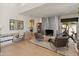 Bright living space with a fireplace, work space, and view of the patio at 523 W Vista Ave, Phoenix, AZ 85021