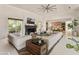 Spacious living room with modern decor, fireplace, and open floor plan at 523 W Vista Ave, Phoenix, AZ 85021
