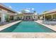 Inviting backyard pool and spa with a travertine deck, offering relaxation and entertainment in a private outdoor setting at 523 W Vista Ave, Phoenix, AZ 85021