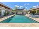 Inviting backyard pool and spa with a travertine deck, offering relaxation and entertainment in a private outdoor setting at 523 W Vista Ave, Phoenix, AZ 85021