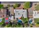 A bird's eye view showing the home and backyard amenities like the pool, tennis court, and multiple patio areas at 5837 E Presidio Rd, Scottsdale, AZ 85254
