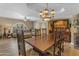 Well-lit dining room offers an elegant space for meals and adjoins the living room at 5837 E Presidio Rd, Scottsdale, AZ 85254