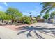 Charming single-story home featuring a well-manicured yard, desert landscaping, and a spacious driveway at 5837 E Presidio Rd, Scottsdale, AZ 85254
