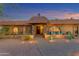 Charming home showcasing beautiful stonework, desert landscaping, and a welcoming entryway at 5837 E Presidio Rd, Scottsdale, AZ 85254
