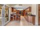 This kitchen boasts granite countertops, dark appliances, a breakfast bar, and beautiful wood cabinetry at 5837 E Presidio Rd, Scottsdale, AZ 85254