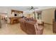 Spacious living room features tile floors, a wet bar, and comfortable seating for entertaining at 5837 E Presidio Rd, Scottsdale, AZ 85254