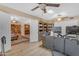 Spacious home office with built-in bookshelves and abundant natural light, perfect for productivity at 5837 E Presidio Rd, Scottsdale, AZ 85254