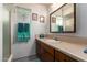 Bathroom featuring a vanity sink and walk-in shower at 6337 E Evergreen St, Mesa, AZ 85205