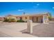 Inviting single-level home featuring desert landscaping, a covered carport, and a mailbox at 6337 E Evergreen St, Mesa, AZ 85205