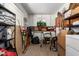 Storage room with white brick walls and upper storage cabinets at 6337 E Evergreen St, Mesa, AZ 85205