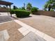 Backyard featuring pergola and gravel landscaping at 6721 E Phelps Rd, Scottsdale, AZ 85254