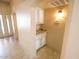Hallway featuring built in cabinets with granite countertop at 6721 E Phelps Rd, Scottsdale, AZ 85254