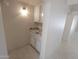Hallway featuring built in cabinets with granite countertop at 6721 E Phelps Rd, Scottsdale, AZ 85254