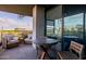 Spacious balcony with comfortable seating, dining table, and views at 7180 E Kierland Blvd # 316, Scottsdale, AZ 85254