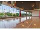 Bright basketball court with hardwood floor, hoops, and natural light at 7180 E Kierland Blvd # 316, Scottsdale, AZ 85254