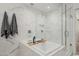 Elegant bathroom featuring a soaking tub, glass shower, and luxurious marble finishes at 7180 E Kierland Blvd # 316, Scottsdale, AZ 85254