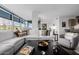 Living room featuring a view to kitchen area and city views at 7180 E Kierland Blvd # 316, Scottsdale, AZ 85254