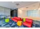 Modern lounge area with colorful furniture and sleek design at 7180 E Kierland Blvd # 316, Scottsdale, AZ 85254