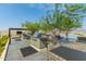 Rooftop deck with a grill, tables, lounge seating, and a pool at 7180 E Kierland Blvd # 316, Scottsdale, AZ 85254