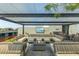 Relaxing rooftop lounge features comfortable seating, a fire pit, and outdoor television at 7180 E Kierland Blvd # 316, Scottsdale, AZ 85254