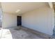 Covered carport with a security door for added safety and protection at 7235 W Flower St, Phoenix, AZ 85033