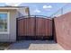 A charming gate that provides security to the backyard at 7235 W Flower St, Phoenix, AZ 85033