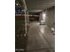 Covered patio featuring a grill, a small pet house, and decorative string lights at 7235 W Flower St, Phoenix, AZ 85033