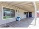 Covered patio with barred windows at 7235 W Flower St, Phoenix, AZ 85033