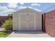 Backyard shed for extra storage in a private backyard at 7235 W Flower St, Phoenix, AZ 85033