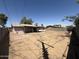 Wide view of the home's spacious backyard and covered patio at 8115 N 56Th Ave, Glendale, AZ 85302