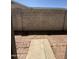 The backyard features a brick-paved patio area enclosed by a block wall at 8115 N 56Th Ave, Glendale, AZ 85302