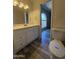 Bright bathroom featuring modern vanity, updated fixtures, and plenty of storage at 8115 N 56Th Ave, Glendale, AZ 85302