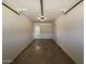 A spacious garage features ample room for parking and storage, with a door to the interior at 8115 N 56Th Ave, Glendale, AZ 85302